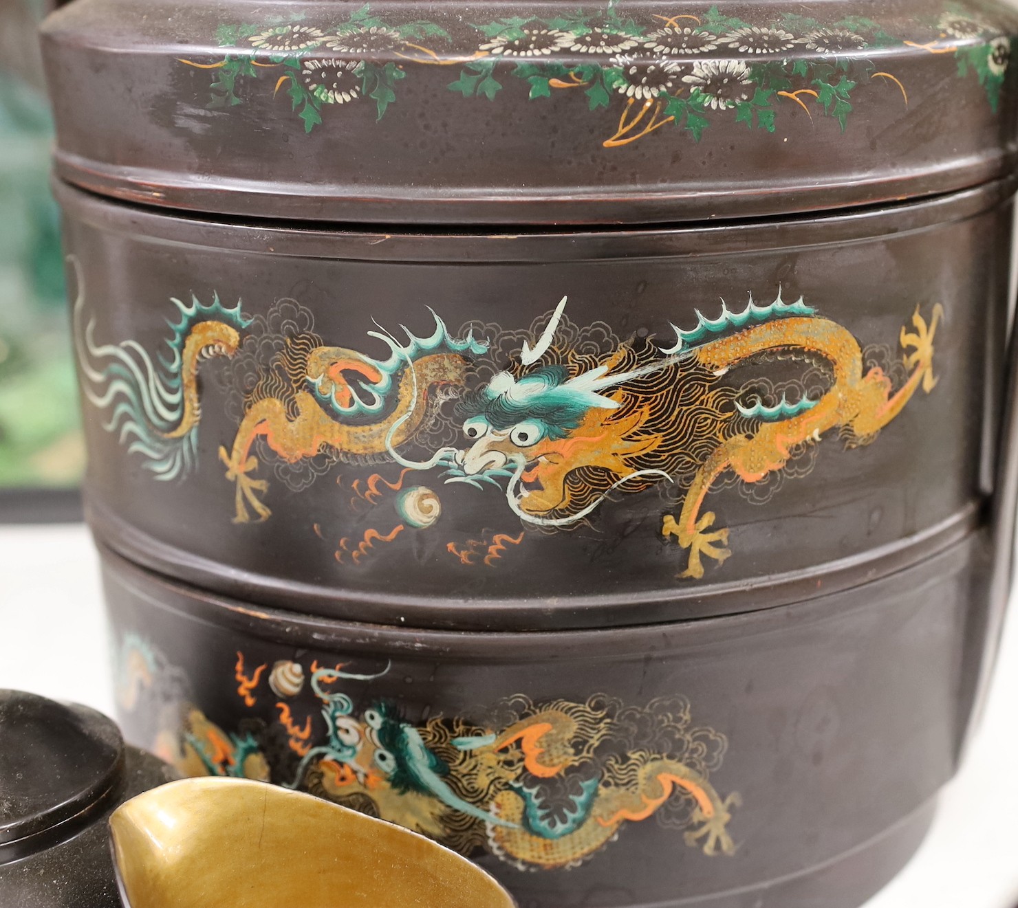 A Chinese Fuzhou lacquer ‘dragon’ wedding basket, 31cm high together with a similar teaset